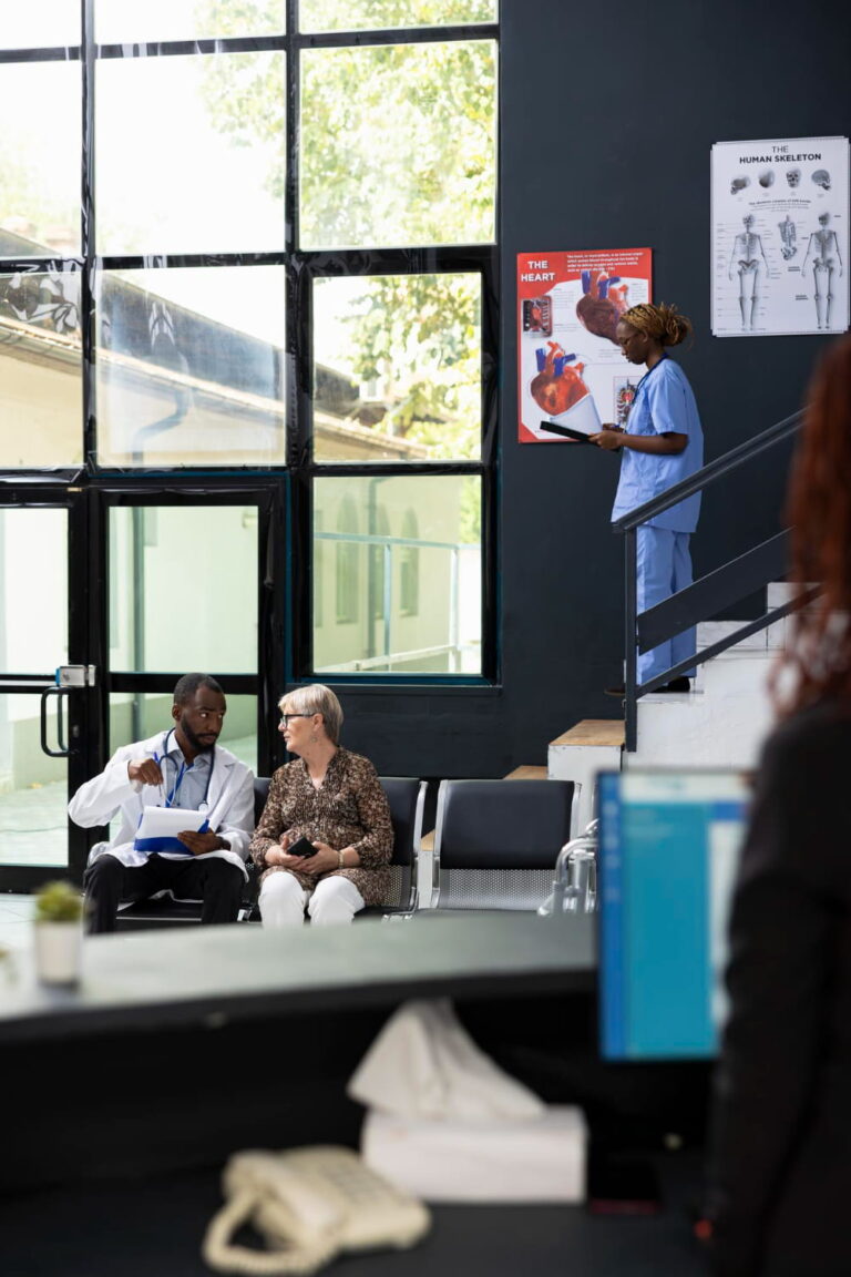 A doctor talking to his patient in the Hospital